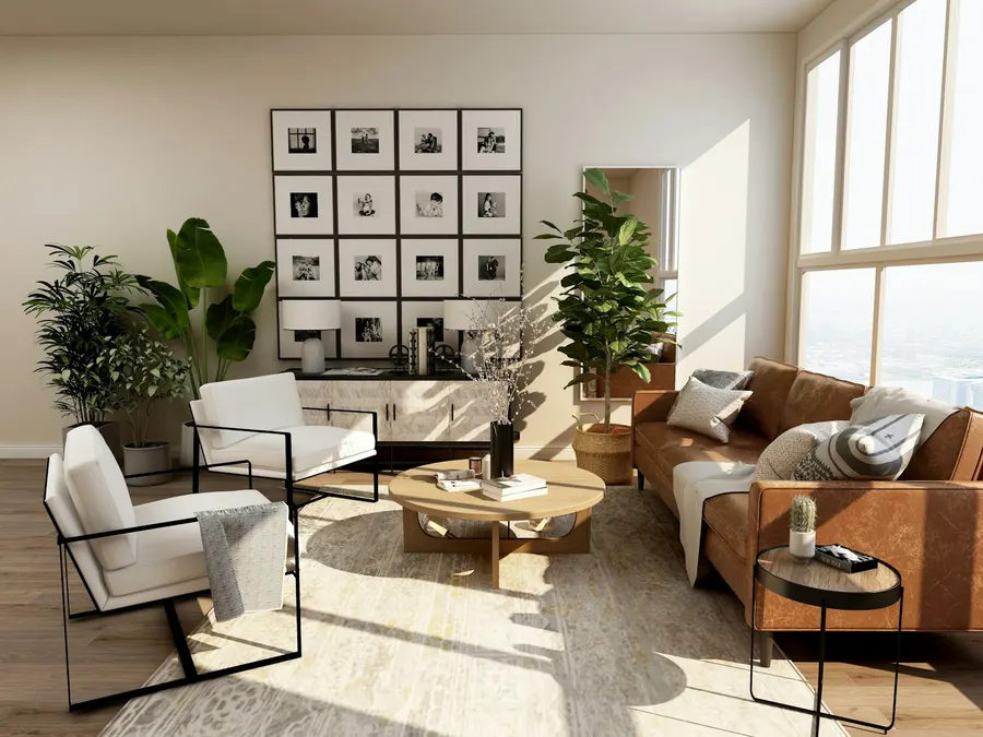Sunny living room with a gallery wall and leather sofa